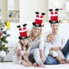 Santa In Chimney Christmas Hat -Christmas Favors Shop Christmas Santa Chimney Hat 1 result 600x600 1
